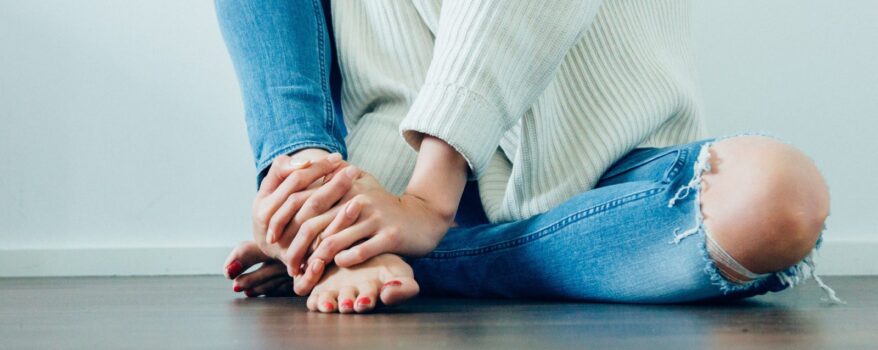 Woman sitting on the floor