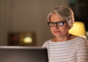 Elderly woman on her computer