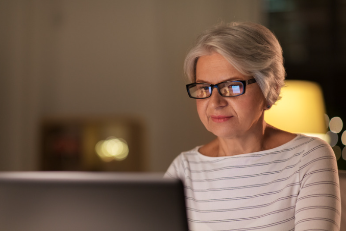 Elderly woman on her computer