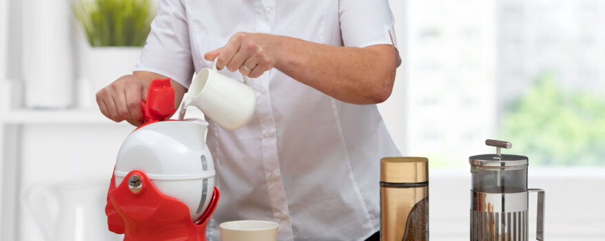 Filling the Uccello Kettle with a small jug